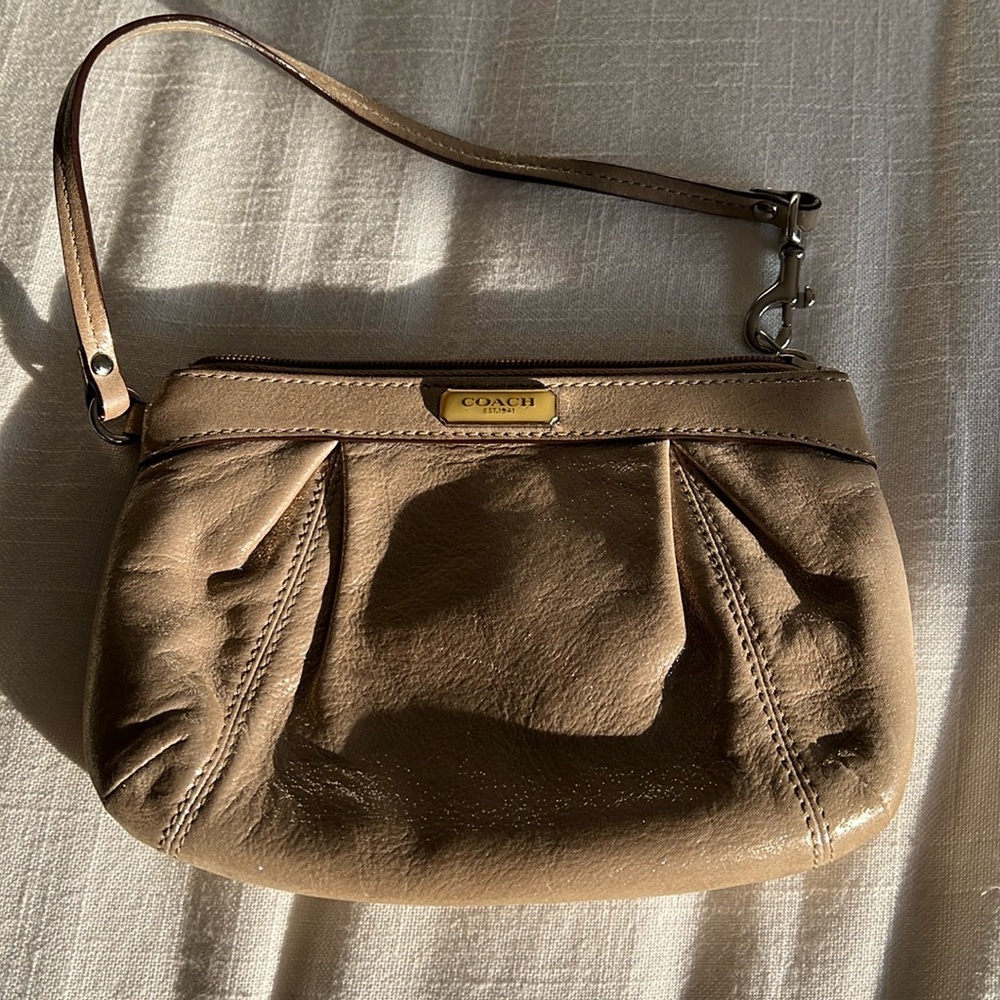 Coach Wristlet Champagne color with pink interior